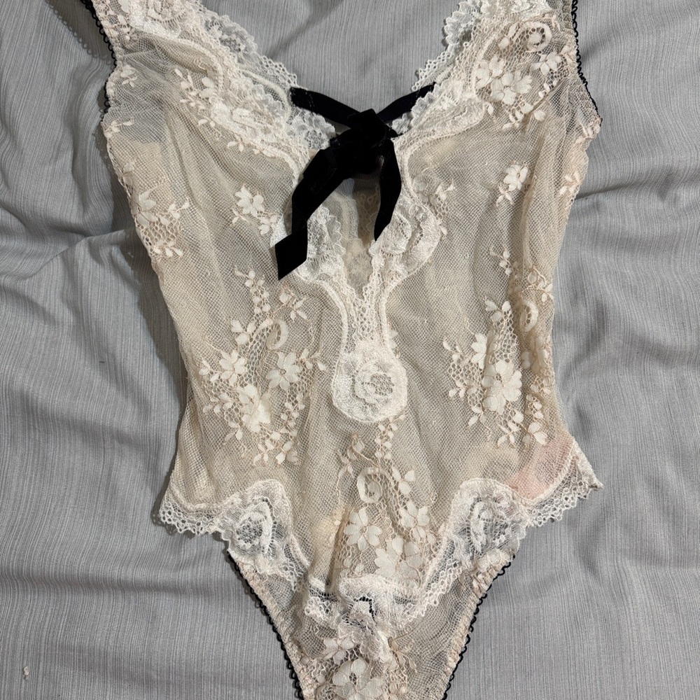 Elegant Lace Bodysuit with Black Bow